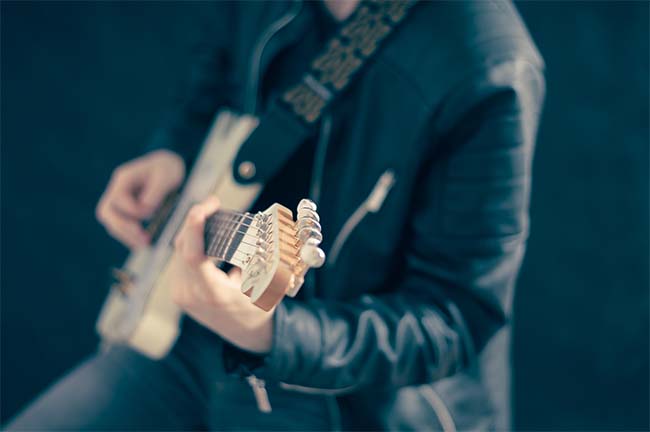 A Man and His Guitar (and strap!)